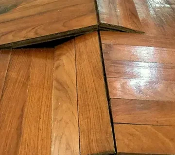 باد کردن پارکت + برسی علت و راه حل تعمیر بالا آمدن پارکت لمینت